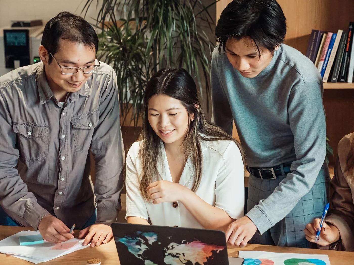 Colleagues discussing a project together, a stock photograph